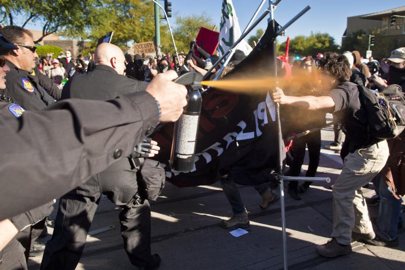 Pepper-sprayed at ALEC protest (photo by Jack Kurtz)