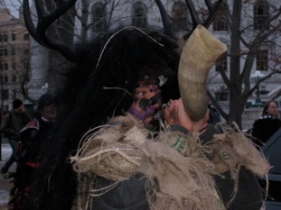 Protesters wore costumes to a New Orleans-style parade down State St