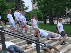 Visiting schoolchildren cautiously navigate a "sea of zombies"